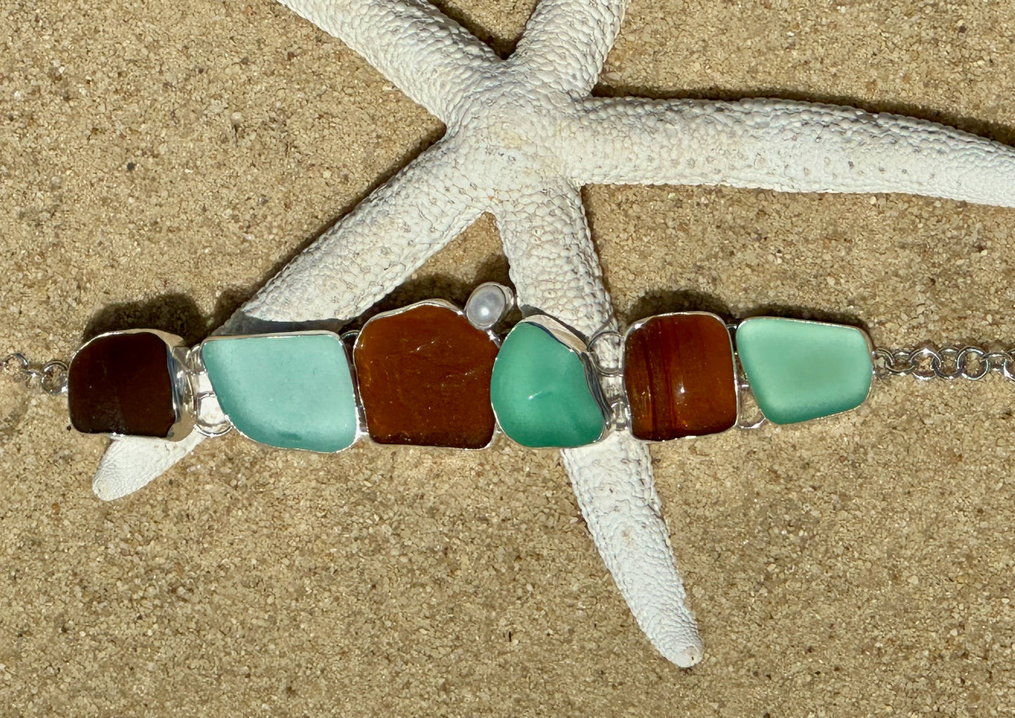 brown and sea foam bottleneck and pearl bracelet