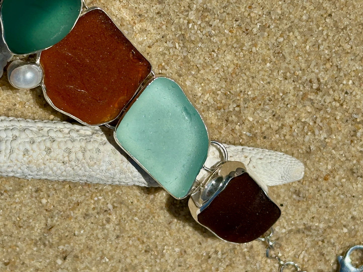 brown and sea foam bottleneck and pearl bracelet