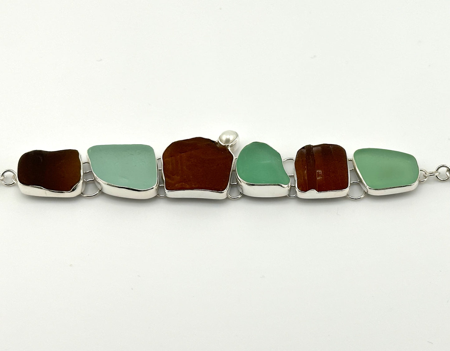 brown and sea foam bottleneck and pearl bracelet