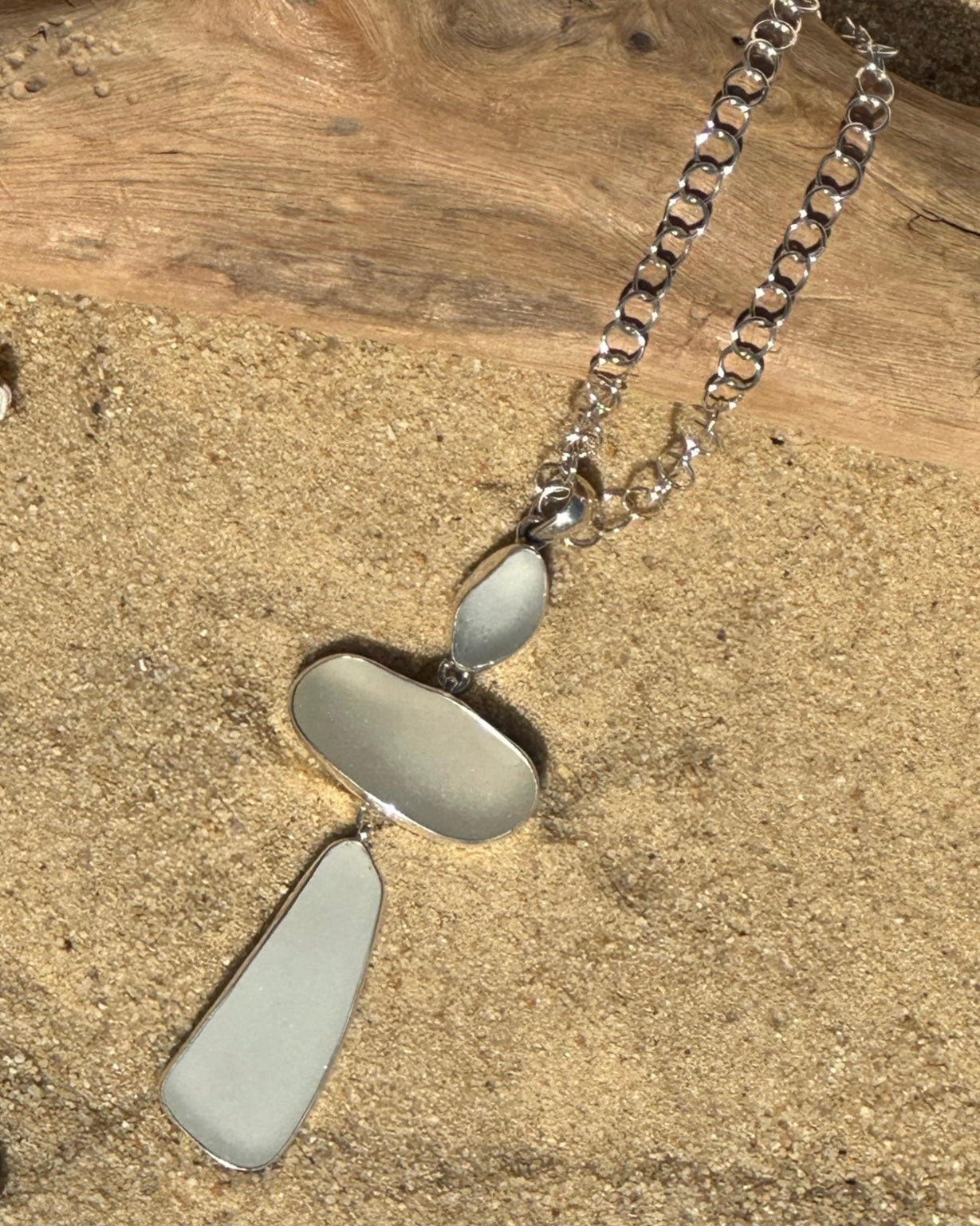 white sea glass cross pendant