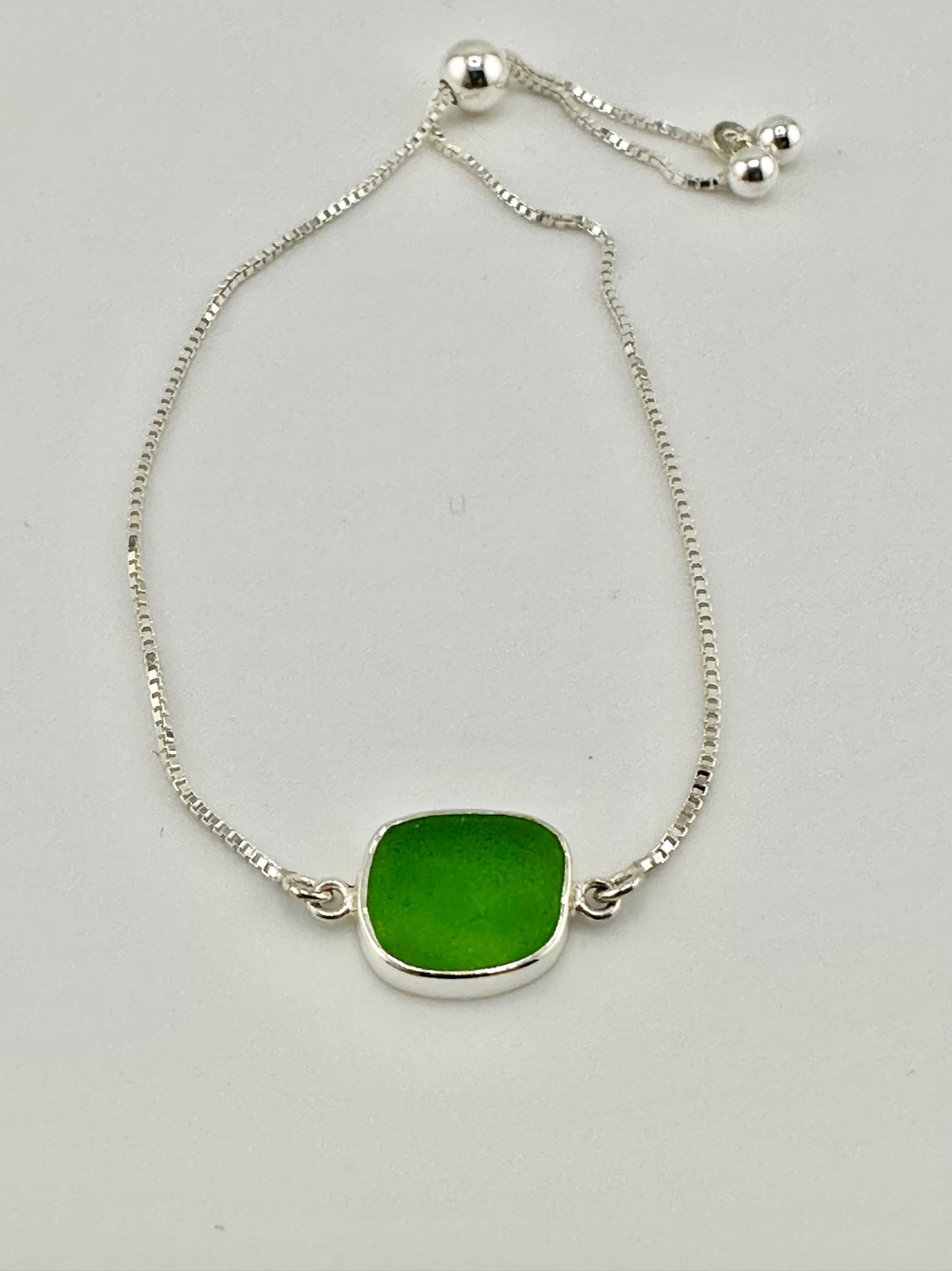 kelly green sea glass pendant bracelet with box chain and slider clasp