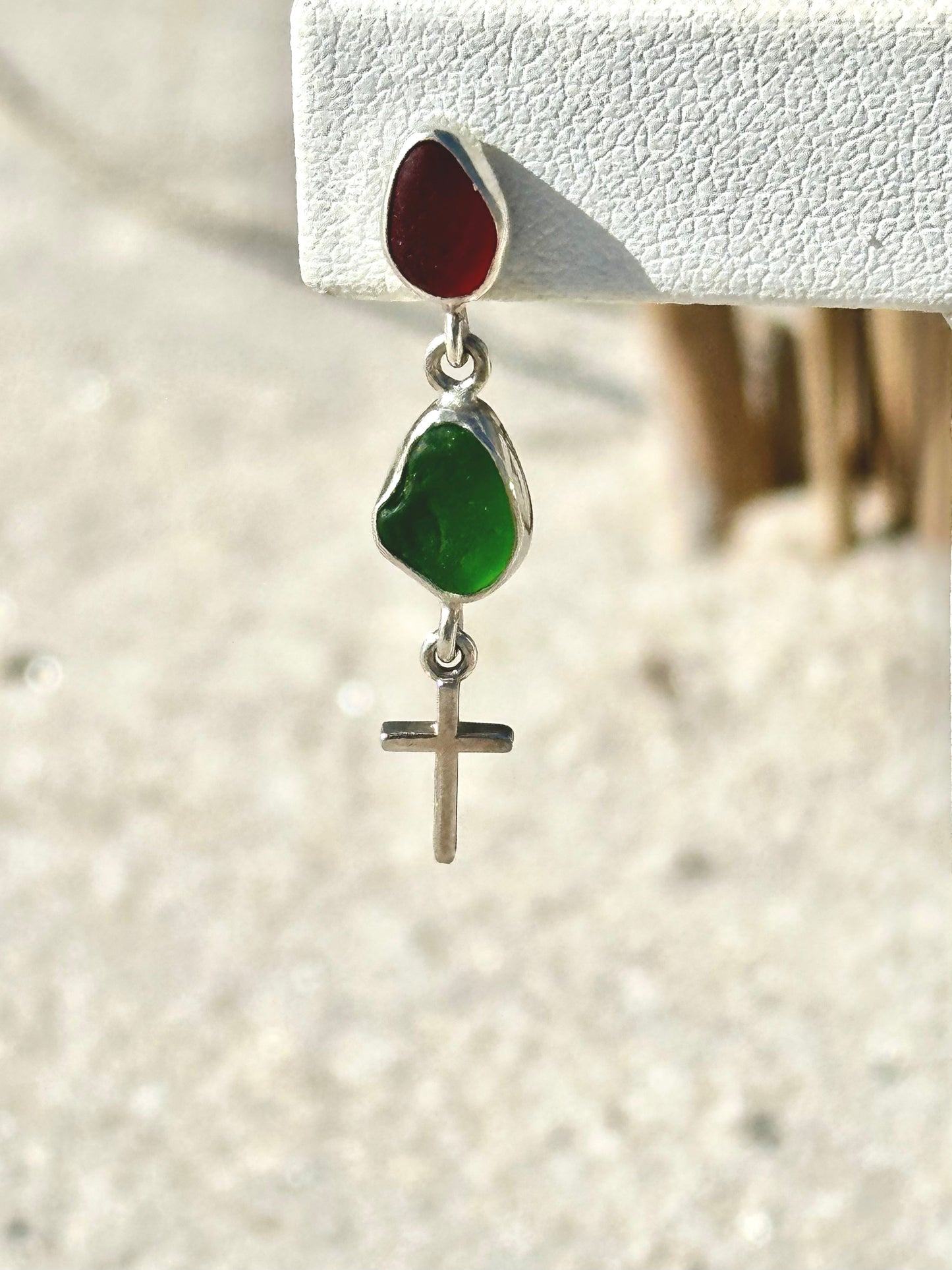 red and green sea glass earrings with a cross