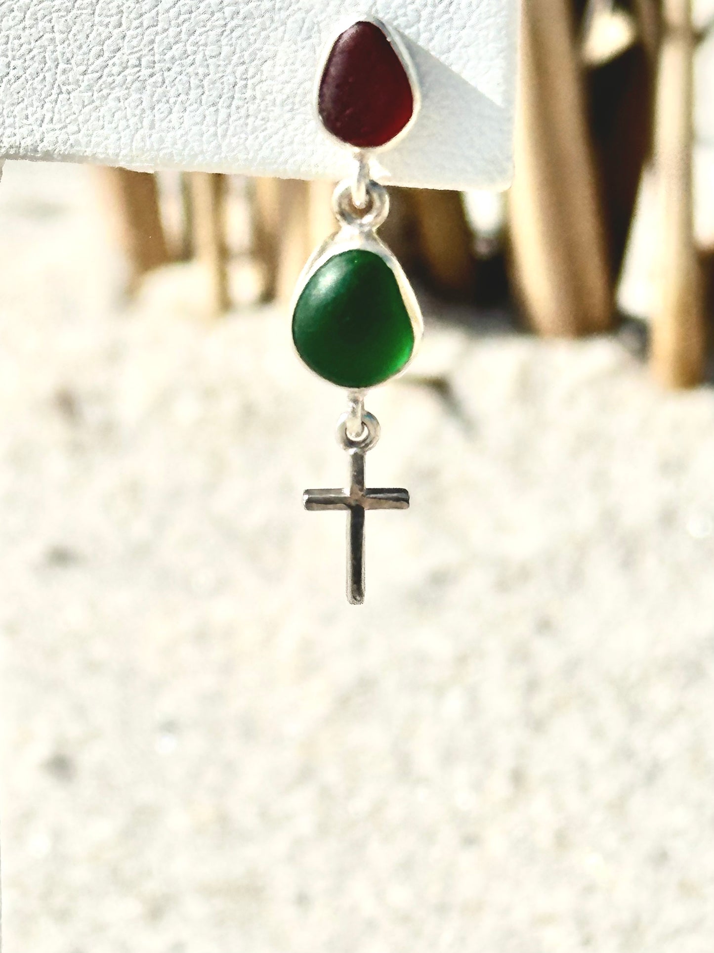 red and green sea glass earrings with a cross