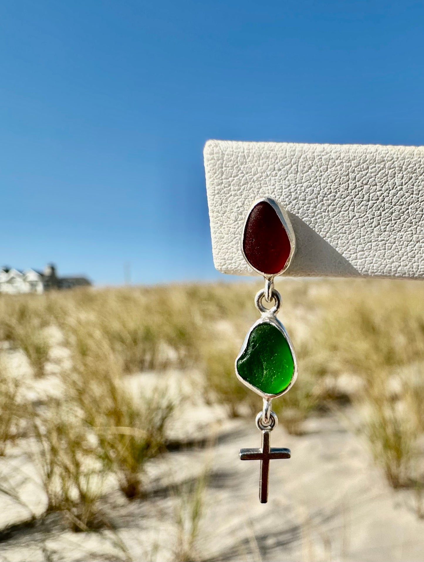 red and green sea glass earrings with a cross