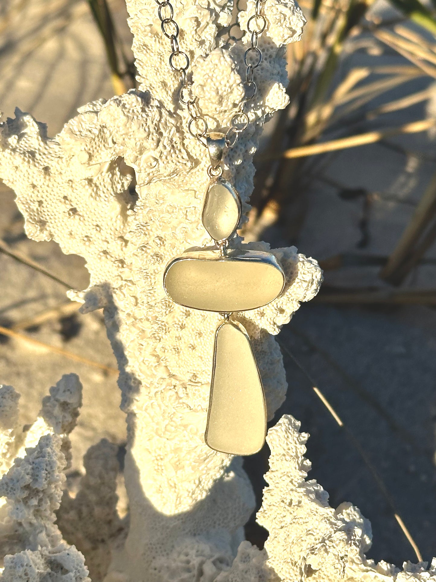 white sea glass cross pendant