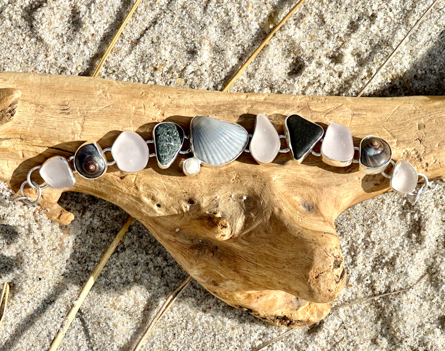black and pink sea glass, shells and beach stone bracelet