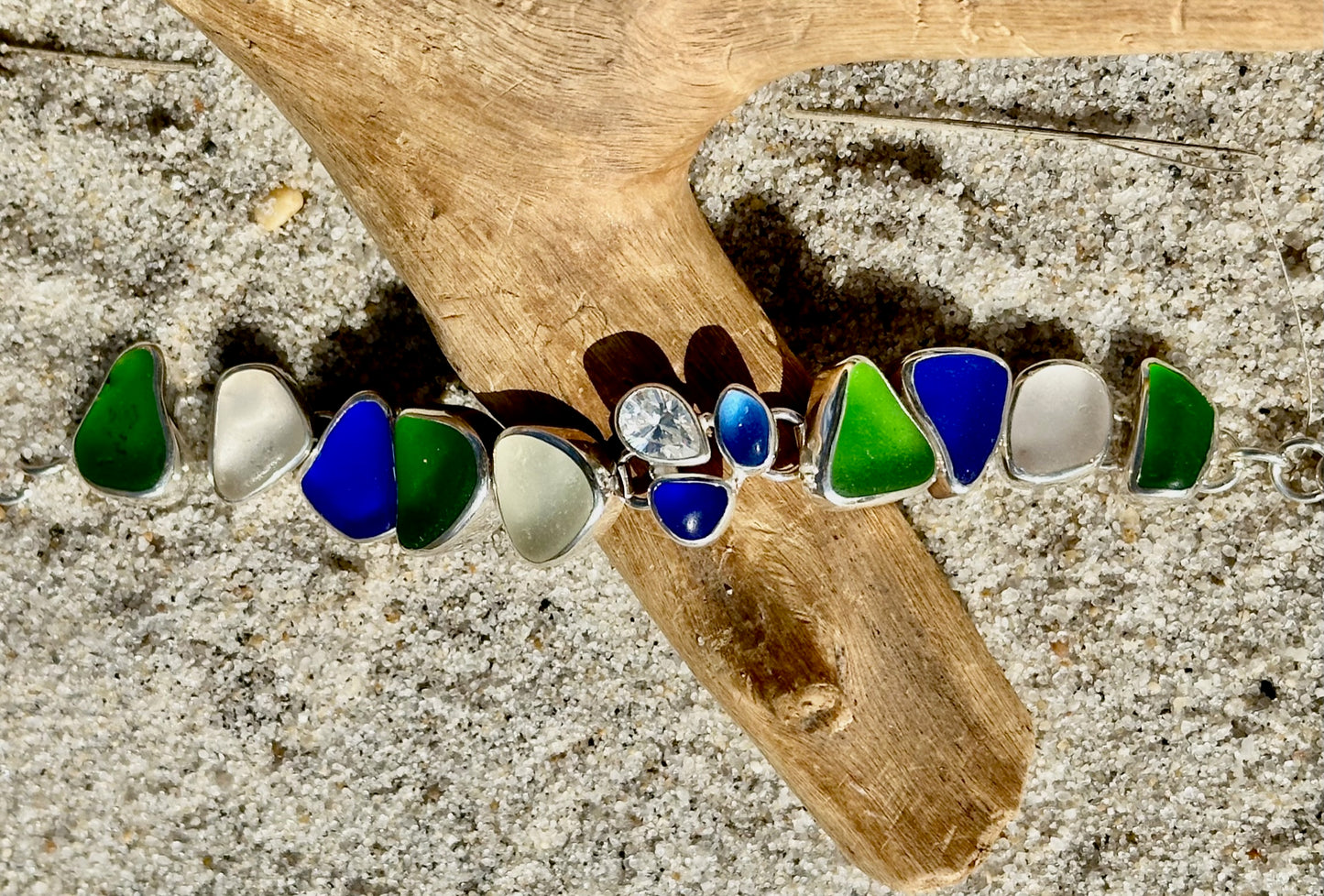 blue, green, and white sea glass bracelet with pear cz