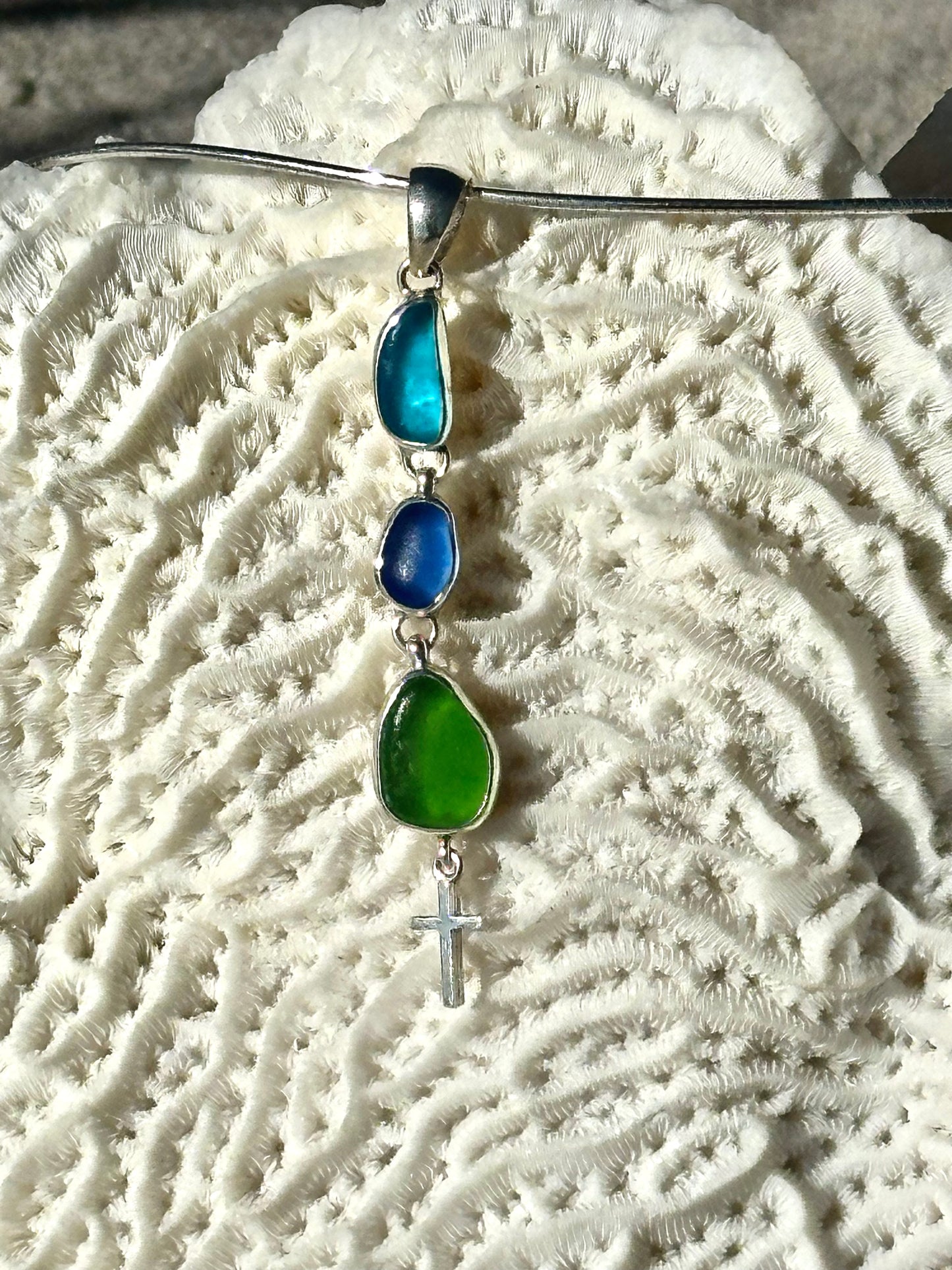 turquoise, blue, and green sea glass cross pendant